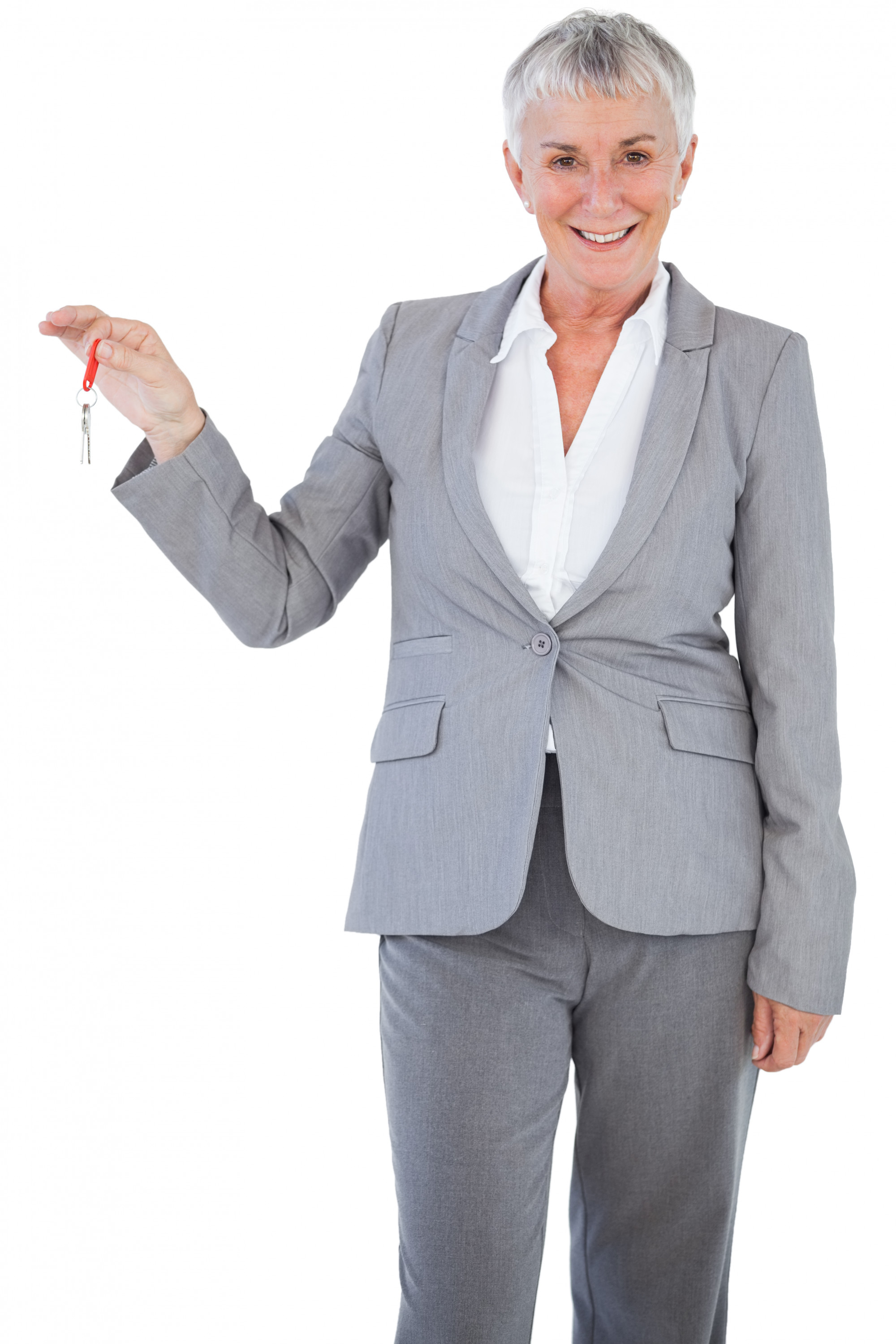 agent handing keys to new owners